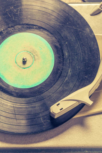 istock Classic gramophone with a stack of vinyl records 1060514600