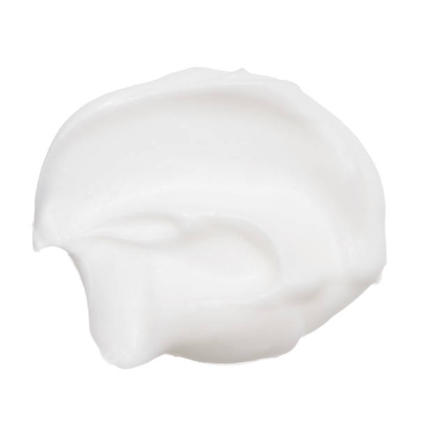 istock Cosmetic foundation close up cream isolated on white background 1060515442
