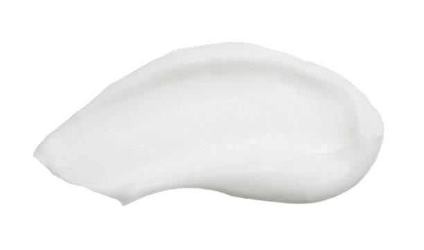 istock Cosmetic foundation close up cream isolated on white background 1060515628