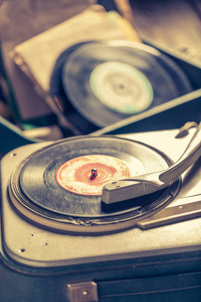 istock Old record player and old vinyls with scratched 1060518194