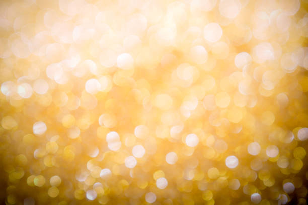 istock abstract background gold light bokeh christmas holiday 1060518892