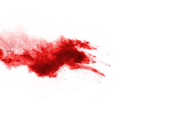 istock Freeze motion of red powder exploding, isolated on white background. Abstract design of red dust cloud. Particles explosion screen saver, wallpaper 1060521020