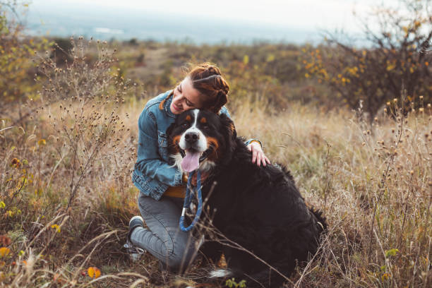 istock Young woman with dog 1060528884