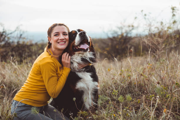 istock Young woman with dog 1060528954
