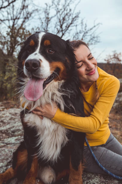 istock Young woman with dog 1060529170