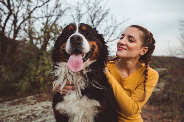 istock Young woman with dog 1060529426