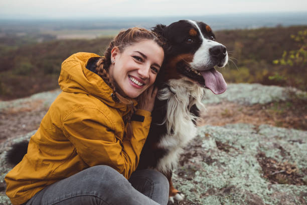 istock Young woman with dog 1060529534