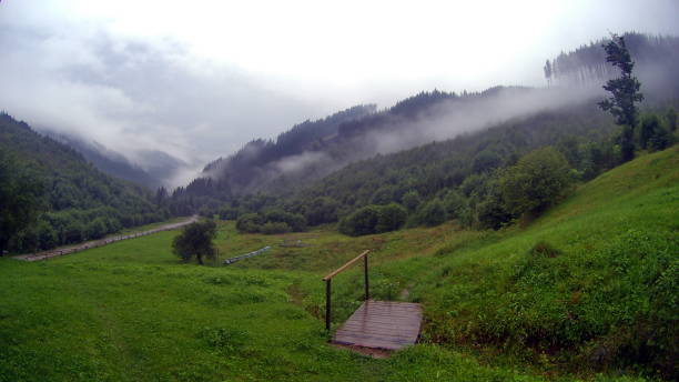 istock Clouds and fog over Carpathian mountains 1060529728