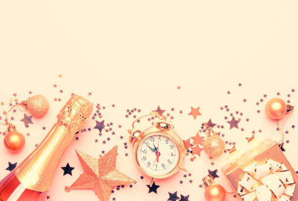 istock Christmas or New Year composition, frame, pink background with gold Christmas decorations 1060535054