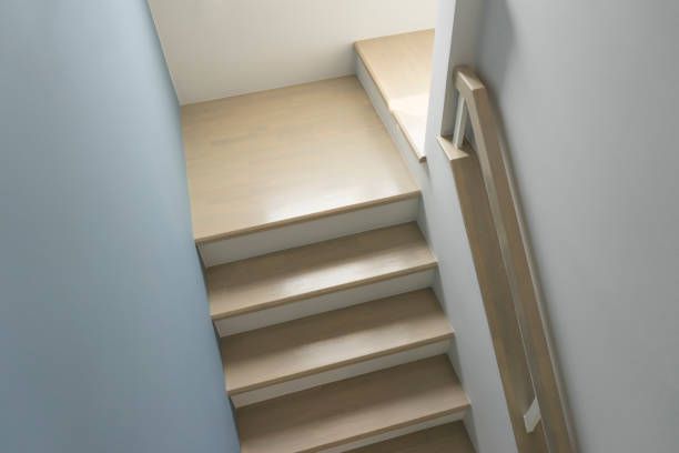 istock modern staircase with white walls 1060540862