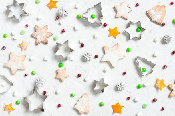 istock Christmas pattern of various sweets on the white textured background 1060542502