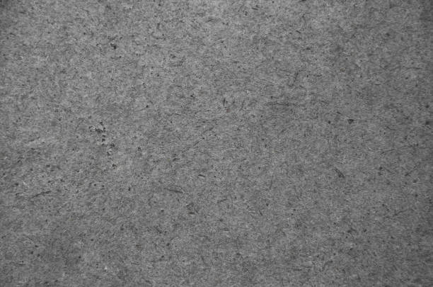 istock Abstract grey background of rough paper surface. 1060547838