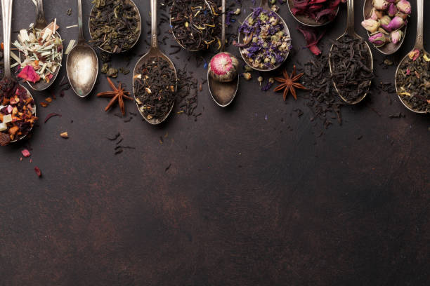 istock Various tea in spoons. Black, green and red tea 1060548098