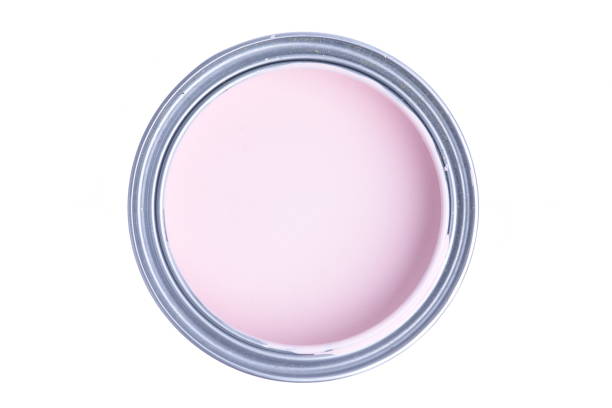 istock Can with pink paint isolated on white background 1060548828