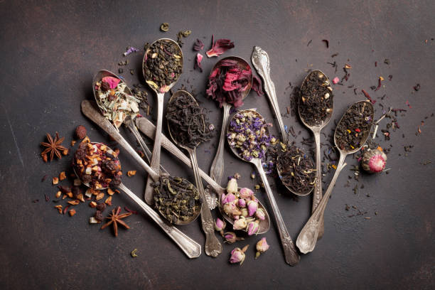 istock Various tea in spoons. Black, green and red tea 1060548924