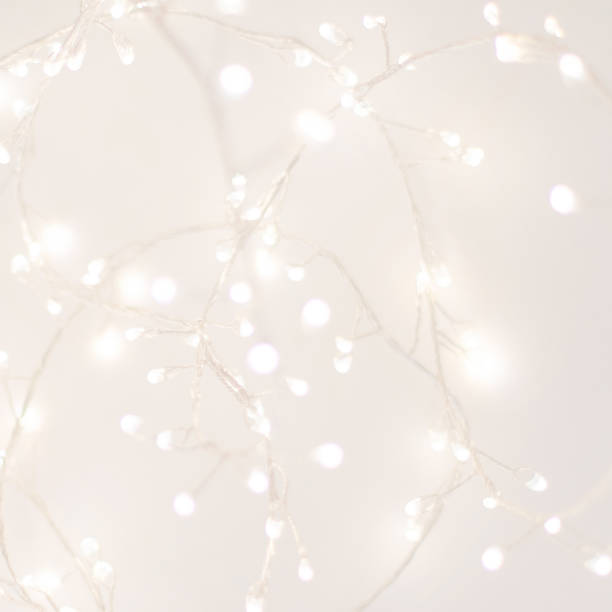 istock Abstract Silver Christmas Winter Background with festive glowing bokeh lights, copyspace 1060550886
