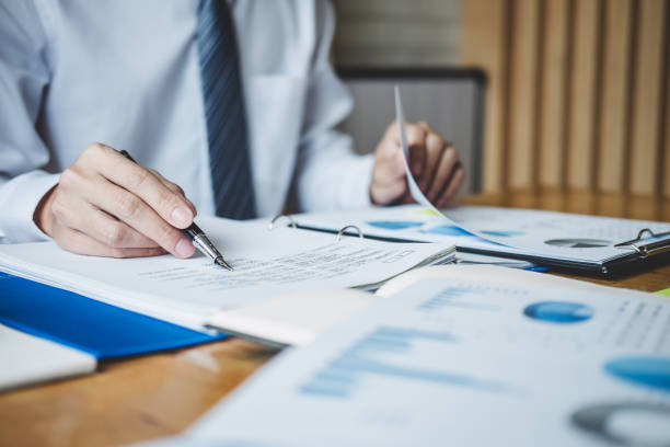 istock Co working conference, Business team meeting present discussing working analysis with financial data and marketing growth report graph in team, Finance, accounting, investment 1060553612