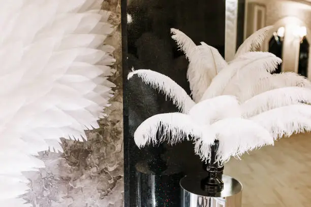 Wedding feather decor in new luxury restaurant.
