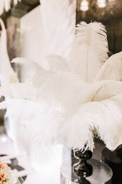 istock White ostrich feather wedding decoration of restaurant 1060554710
