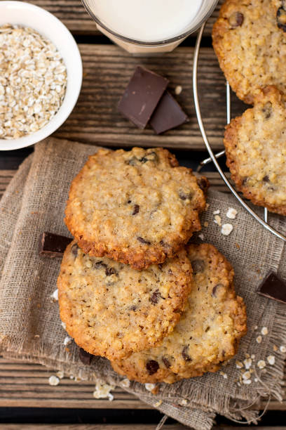 istock Oatmeal cookies with chocolate served with milk 1060555030