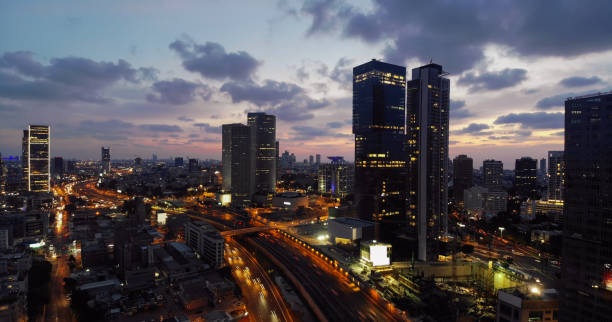 istock Modern office building downtown cityscape skyscraper skyline aerial view night 1060565724