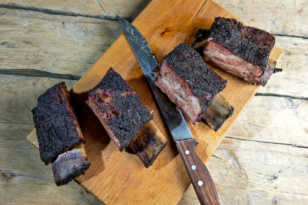 istock Smoked beef ribs cut on chopping board 1060567998