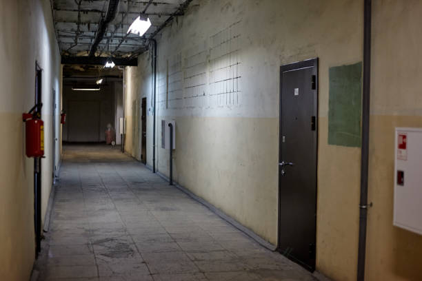 istock Industrial hallway with doors 1060571188