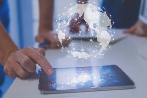 istock Global network connection around digital globe, internet of things (IoT) concept, worldwide finance technology (fintech), international communication, business people using digital tablet 1060572802