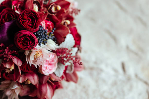 Bridal bouquet, fresh flowers of red color