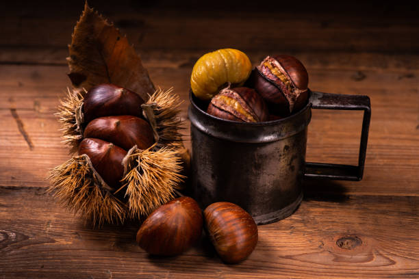 istock raw browns and roast chestnuts 1060580946