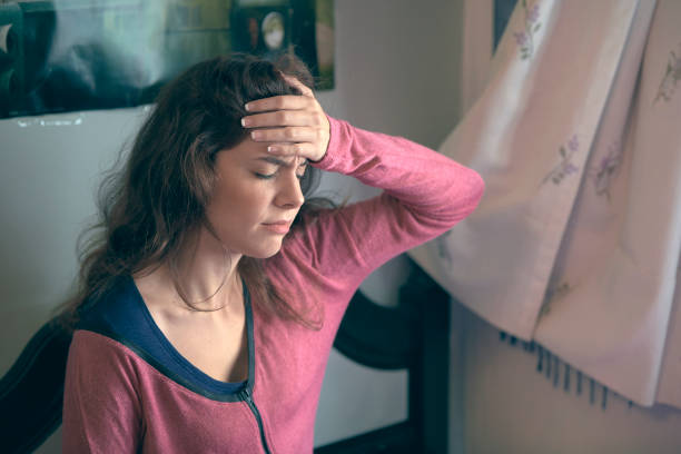 istock getting up in the morning with headache 1060588784