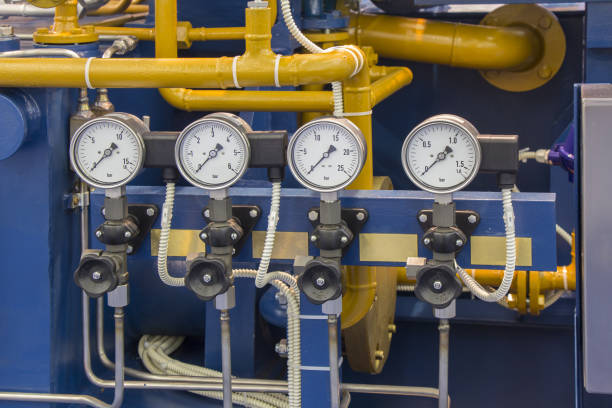 istock System's cooper pipes with Four manometers with valves 1060591762