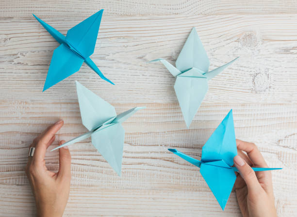 istock Blue origami crane birds. 1060596158