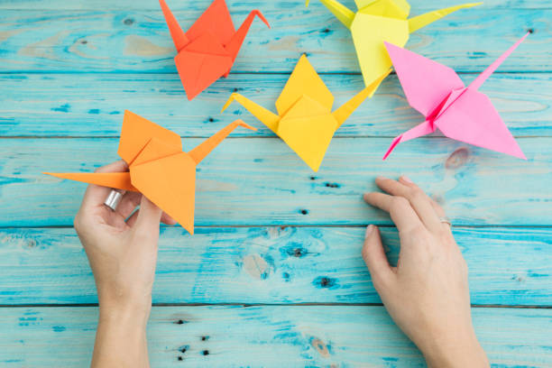 istock Origami. Blue background. 1060599918