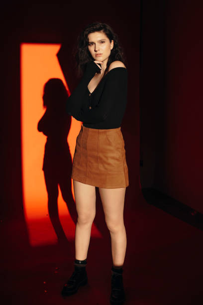 istock Thoughtful female in dark room 1060600092