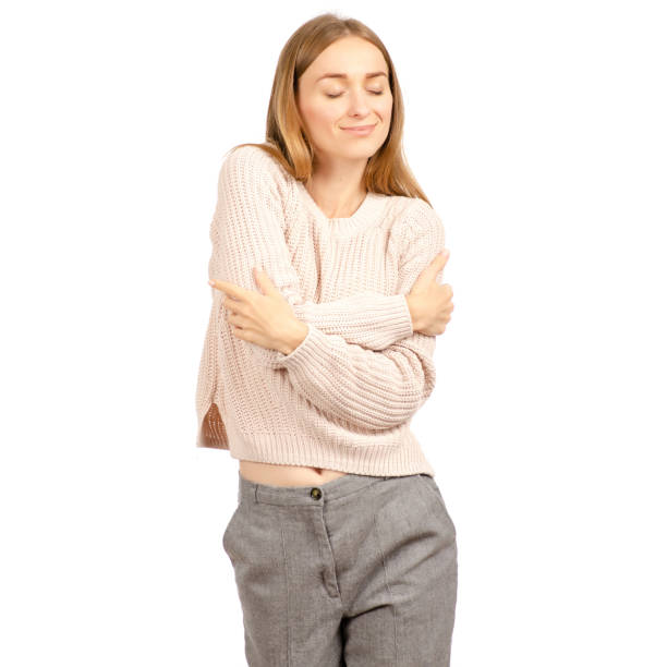 istock Beautiful woman in a sweater is smiling cold 1060600266