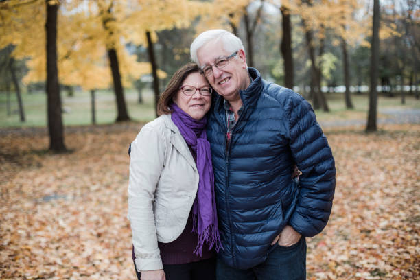 istock Portrait a a senior couple during fall season 1060610536