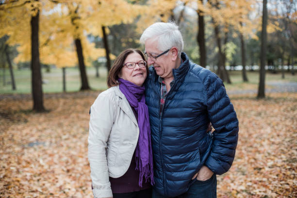 istock Portrait a a senior couple during fall season 1060610586