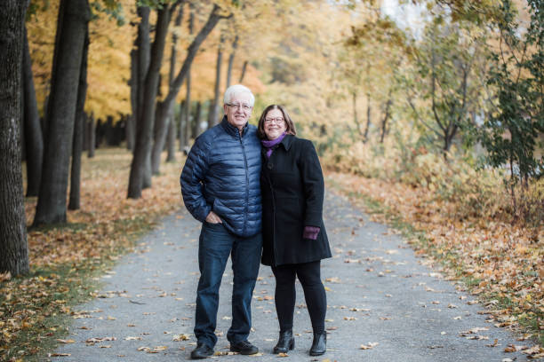 istock Portrait a a senior couple during fall season 1060610786