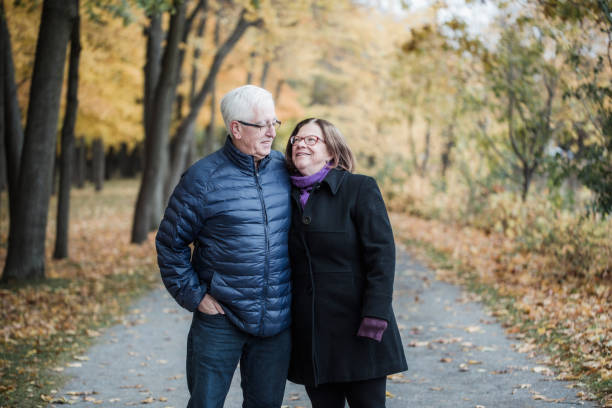 istock Portrait a a senior couple during fall season 1060610906