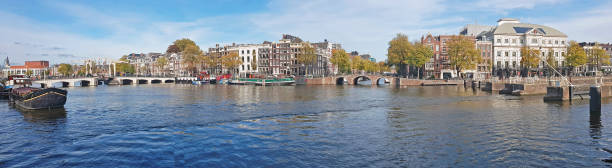 istock Panorama from the city Amsterdam with the Tiny bridge in the Netherlands 1060617690