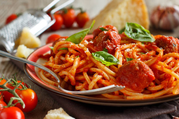 istock Pasta with tomato sauce and meatballs 1060624278