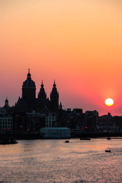 istock Church of St Nicholas, Amsterdam, at sunset 1060624662