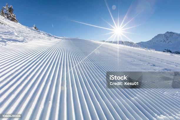 Fresh Snow On Ski Slope During Sunny Day Stock Photo - Download Image Now - Ski Slope, Ski Track, Ski