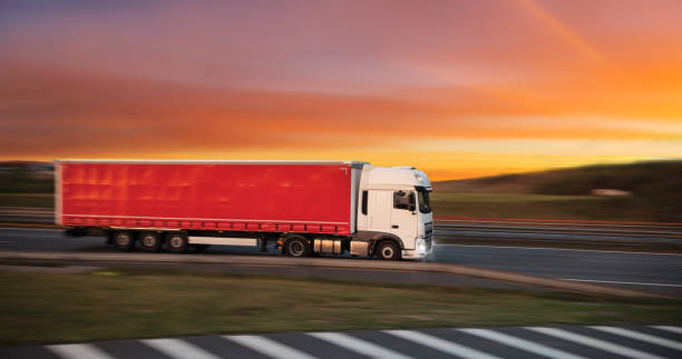 istock Truck with container on road, cargo transportation concept. 1060628582