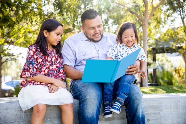 Dad Reading to his children