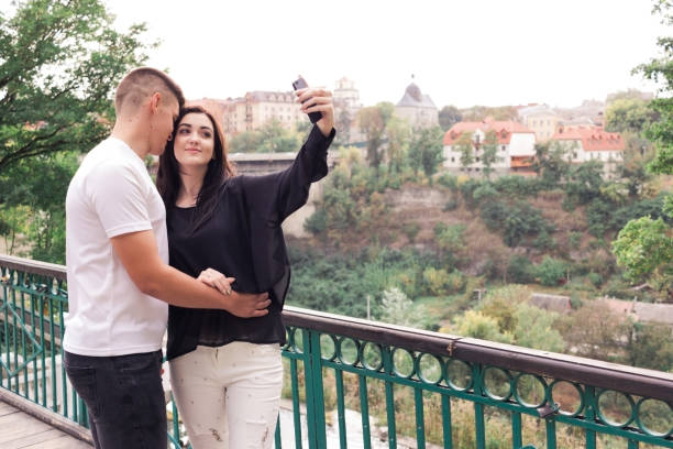 istock Lovers guy with a girl take a selfie 1060643106