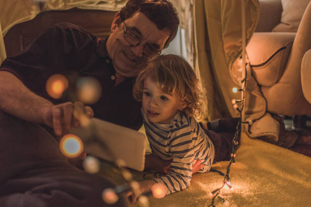 istock Enjoying in a tent with my grandfather 1060652416