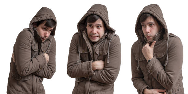 istock Young man feel cold. Isolated on white background. 1060664616