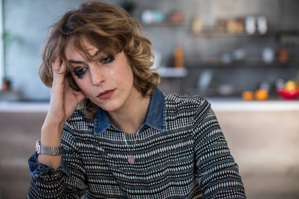 istock Sad woman at home 1060666208